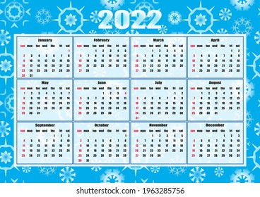 calendar for 2022. grid on one page. bright blue background with snowflakes. horizontal cover. a4.