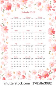 Calendar for 2022 year with frame from cute pink flowers. Week starts on sunday. 