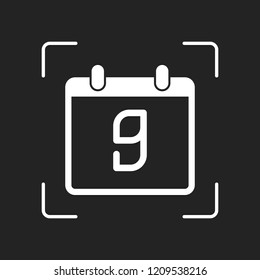 calendar with 9 day, simple icon. White object in camera autofocus on dark background