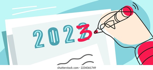 Calendar changing date from 2022 to 2023 with marker, new year holidays background. New Year celebration.