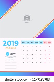 Calendar design for August 2019. Simple blue with orange background. Week starts on Monday. Vector design print template with place for photo. 