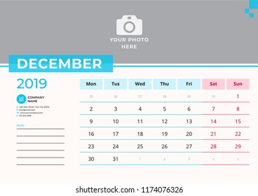 Calendar design for December 2019. Simple blue color. Week starts on Monday. Vector design print template with place for photo.