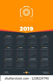 Calendar design template for 2019 year. Week starts on Sunday. Stationery design. Vector calendar poster with place for photo