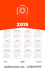 Calendar design template for 2019 year. Week starts on Monday. Stationery design. Vector calendar poster with place for photo