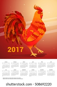 Calendar with a fiery rooster. Calendar 2017 with a rooster. Calendar Week starts on Monday. Fire Rooster symbol 2017.