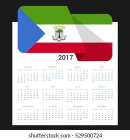 Calendar grid for 2017 with Equatorial Guinea flag on 2017. National flag on a Black background with shadow. Sundays first. Best for business and office needs. Vector illustration
