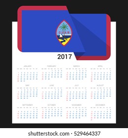 Calendar grid for 2017 with Guam flag on 2017. National flag on a Black background with shadow. Sundays first. Best for business and office needs. Vector illustration