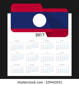 Calendar grid for 2017 with Laos flag on 2017. National flag on a Black background with shadow. Sundays first. Best for business and office needs. Vector illustration