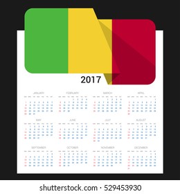 Calendar grid for 2017 with Mali flag on 2017. National flag on a Black background with shadow. Sundays first. Best for business and office needs. Vector illustration