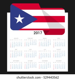 Calendar grid for 2017 with Puerto Rico flag on 2017. National flag on a Black background with shadow. Sundays first. Best for business and office needs. Vector illustration