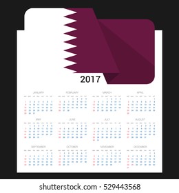 Calendar grid for 2017 with Qatar flag on 2017. National flag on a Black background with shadow. Sundays first. Best for business and office needs. Vector illustration