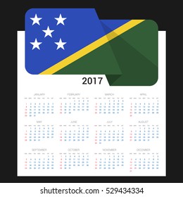 Calendar grid for 2017 with Solomon Islands flag on 2017. National flag on a Black background with shadow. Sundays first. Best for business and office needs. Vector illustration

