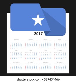 Calendar grid for 2017 with Somalia flag on 2017. National flag on a Black background with shadow. Sundays first. Best for business and office needs. Vector illustration
