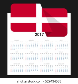 Calendar grid for 2017 with Sovereign Military order of Malta flag on 2017. National flag on a Black background with shadow. Sundays first. Best for business and office needs. Vector illustration
