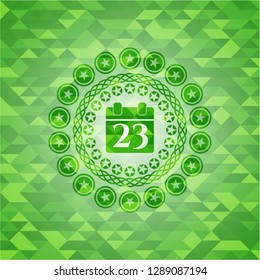 calendar icon inside realistic green emblem. Mosaic background