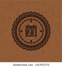calendar icon inside retro style wood emblem