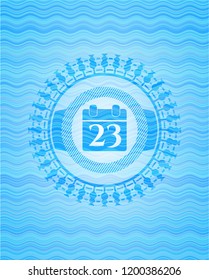 calendar icon inside sky blue water wave style badge.