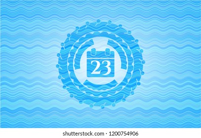 calendar icon inside sky blue water emblem background.