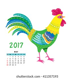Calendar for may 2017 isolated on white,  with the rooster - symbol of the year.

