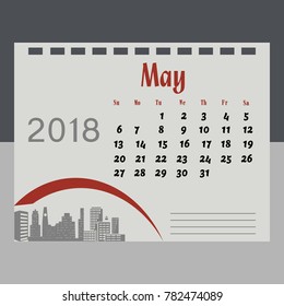 Calendar for May 2018 on grey with city skyscrapers