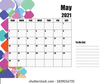 Calendario para mayo de 2021. El fondo blanco de la izquierda tiene cuadrado de varios tamaños y colores.