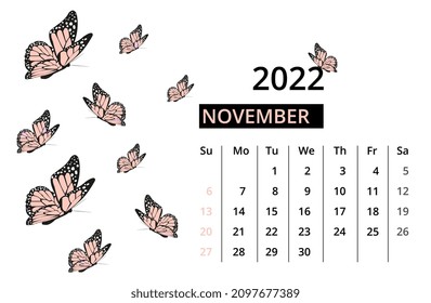 Calendar for November 2022. Desktop calendar with butterlies. Isolated on white background. Close-up. Week starts sunday.