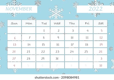 Calendar November 2022. calendar template with snowflakes. Isolated on blue background. Week starts sunday.