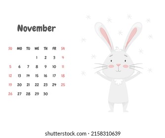 The Calendar Page For The Month Of November 2023 With A Cute Smiling Rabbit, Rejoicing In The Flying Snowflakes. Adorable Animal, Character In Pastel Colors. Vector Illustration On A White Background