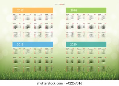 Calendar set of 2017, 2018, 2019 and 2020 year - Week starts from Sunday with grass field and light blurred bokeh for background. Vector illustration.