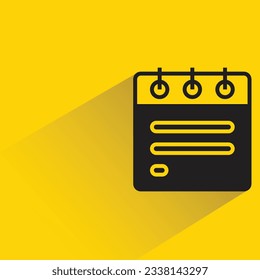 calendar with shadow on yellow background