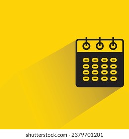 calendar with shadow on yellow background