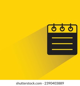 calendar with shadow on yellow background