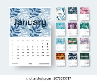 Calendar template for 2022 with tropical, leaves, botanical theme, indicated weeks of the year, on a white background. Fashionable wall, desk calendar for offices, home. Vector planner illustration