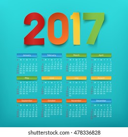 Calendar template for a year 2017 on blue background. Vector illustration.