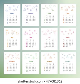 Calendar year 2017 with many different simple doodle colored illustrations for each month