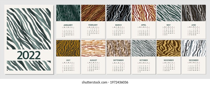calendar for the year 2022 with the tiger texture symbol of the year. vector drawing