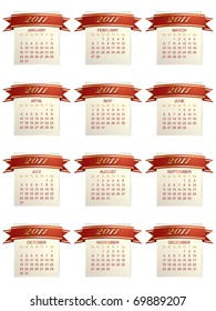 calender for 2011 with red and gold ribbons isolated on white