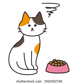 A calico cat with a dissatisfied look on food.