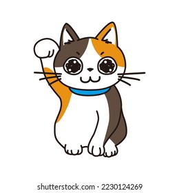 A calico cat with sparkling eyes that poses as a beckoning cat.