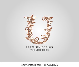 Diseño del logotipo de la letra caligráfica U, elegante vector de diseño de alfabeto floral ornamentado.