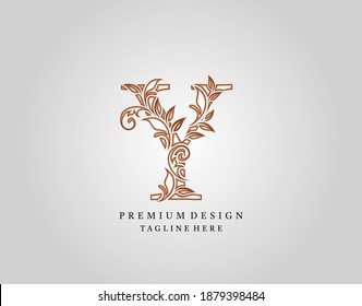 Caligraphic Y Letter logo design, elegant floral ornate alphabet design vector.