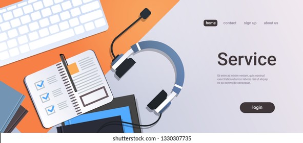 call center manager workplace support service concept top angle view desktop with headphones organizer notepad keyboard office stuff horizontal copy space