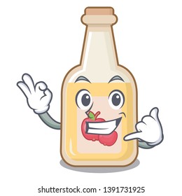 Call me bottle apple cider above cartoon table