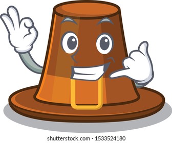 Call me pilgrim hat on a cartoon table
