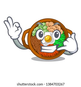 Call me plate containing bibimbap cartoon on table