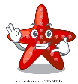 Call me toy red starfish cartoon above table