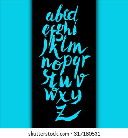 Calligraphic alphabet, font, black and white background. Letters written with a brush or chalk.