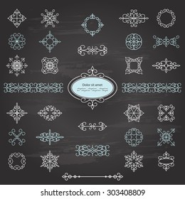 Calligraphic design elements set on chalkboard.