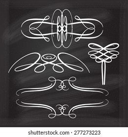 Calligraphic design elements vector set on the blackboard