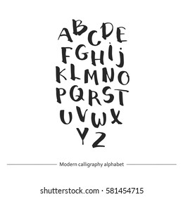 Calligraphic font. Handwritten alphabet in brush style.
